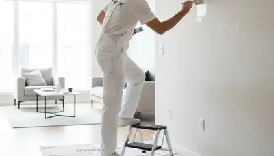 Hartford, CT painter repairing paint touch-ups for chips, scuffs, and peeling on a home wall